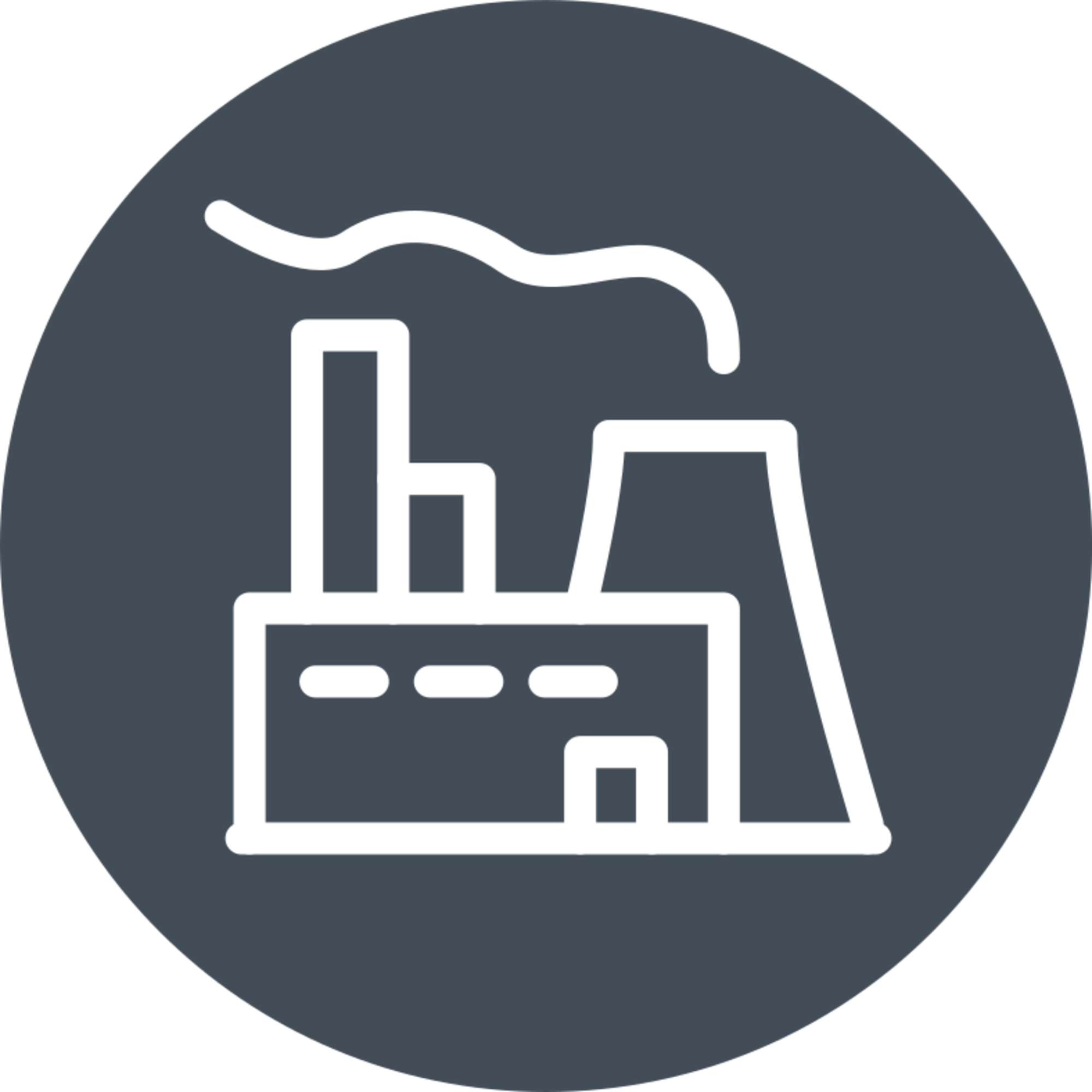 edificio industrial con chimenea y fachada de fábrica