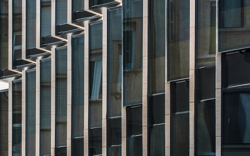 Modern glass façade with solar shading louvres