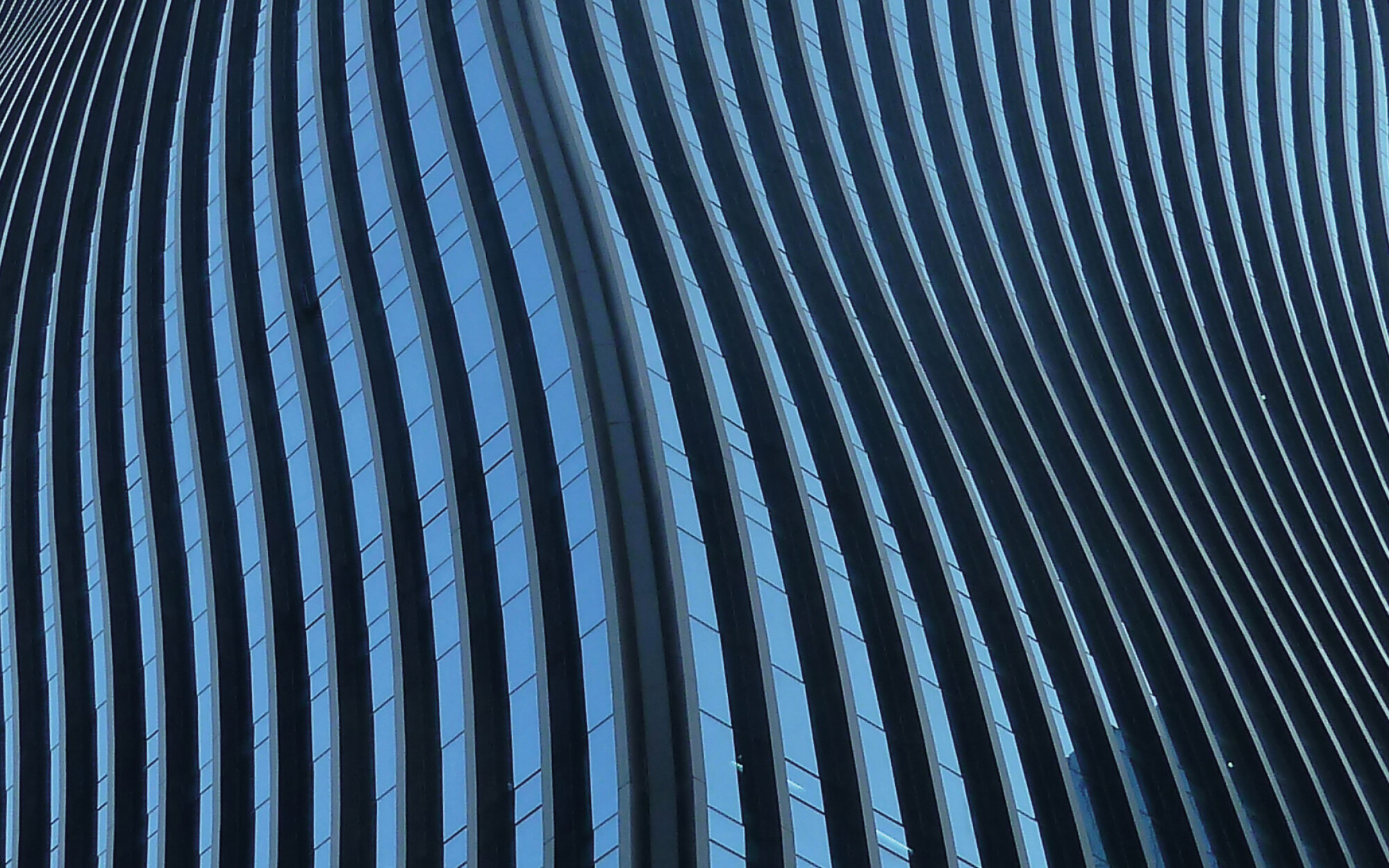 wave-shaped glass-aluminium façade