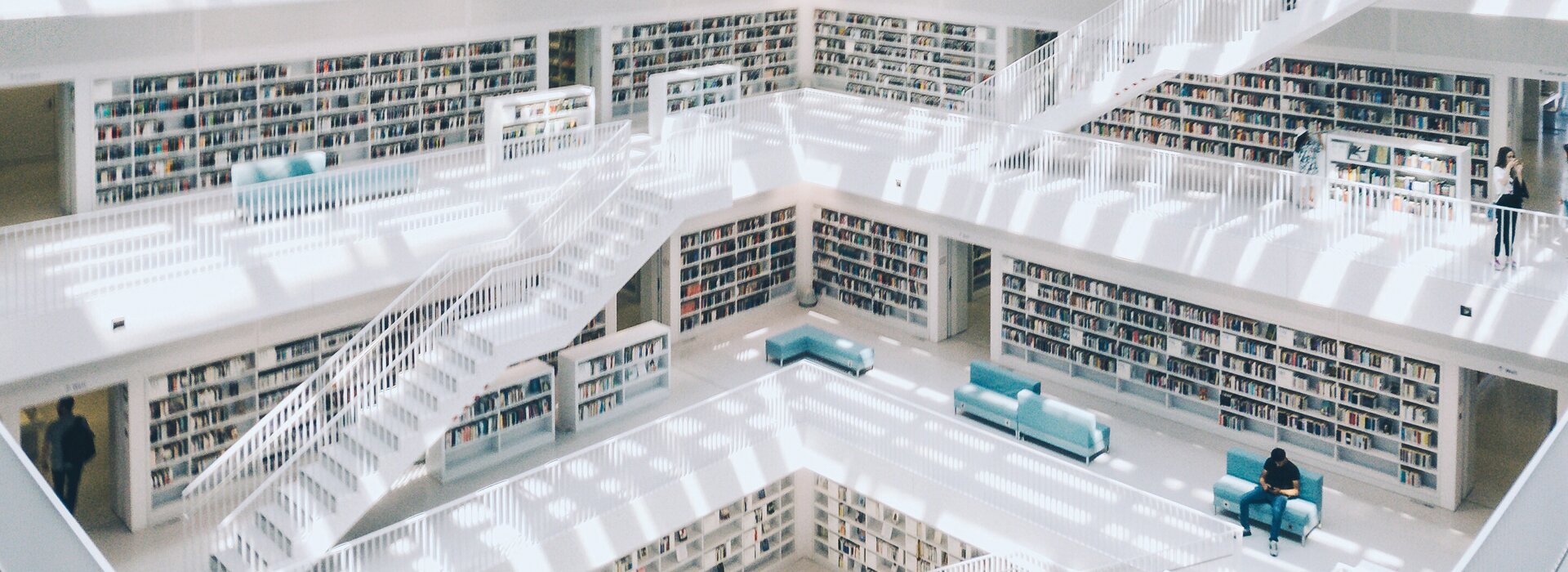 Modern library with stairs and books